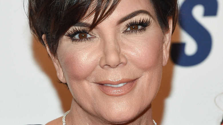 Kris Jenner smiling on the red carpet