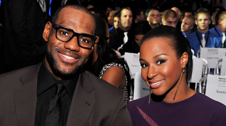 LeBron and Savannah James sit together