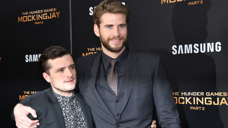 Josh Hutcherson and Liam Hemsworth at Mockingjay premiere