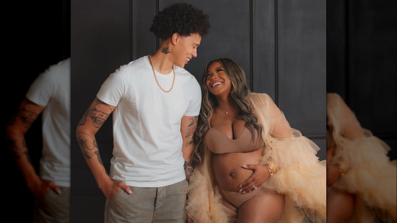 Brittney Griner and Cherelle showing off her baby bump