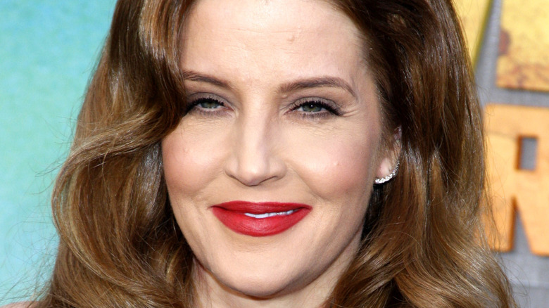 Lisa Marie Presley smiles on red carpet