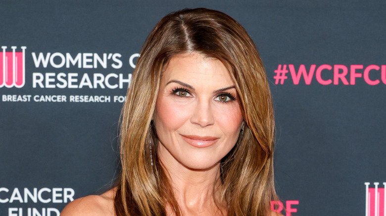 Lori Loughlin poses in March 2026