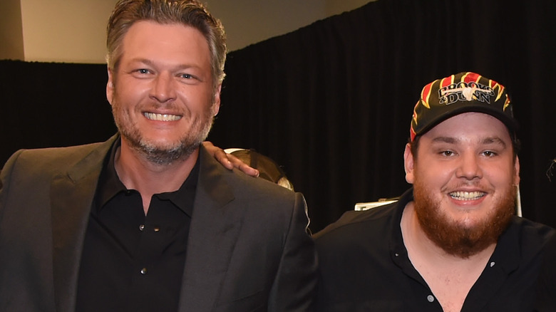 Blake Shelton and Luke Combs grinning