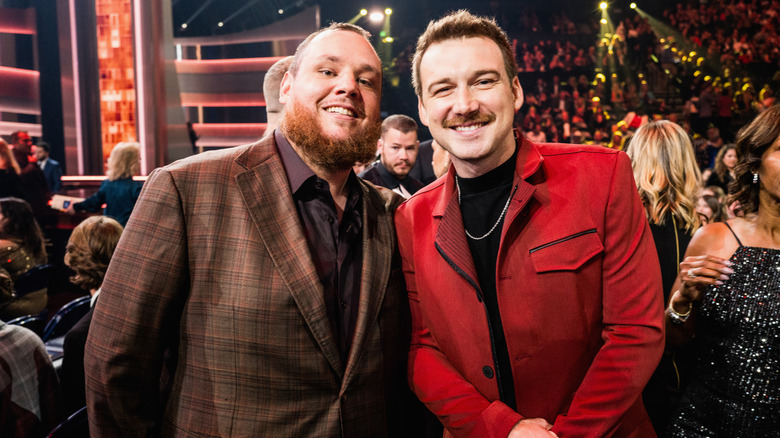 Luke Combs and Morgan Wallen posing