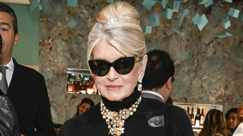 Martha Stewart poses in a "Breakfast at Tiffanys" inspired outfit for a food and wine festival event at Blue Box Cafe.
