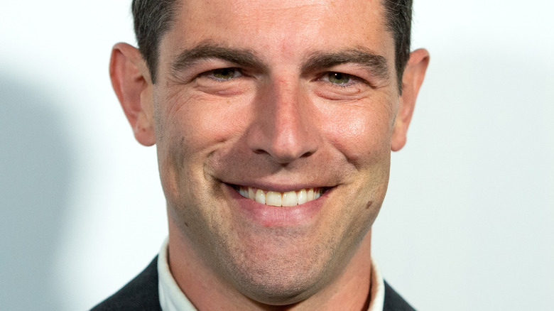 Max Greenfield smiling