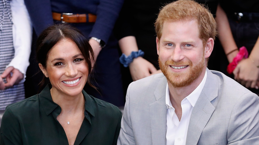 Meghan Markle and Prince Harry smiling