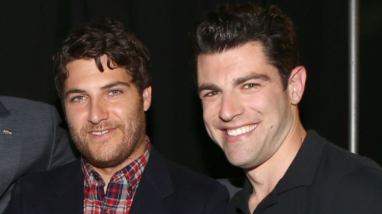 Adam Pally and Max Greenfield smiling