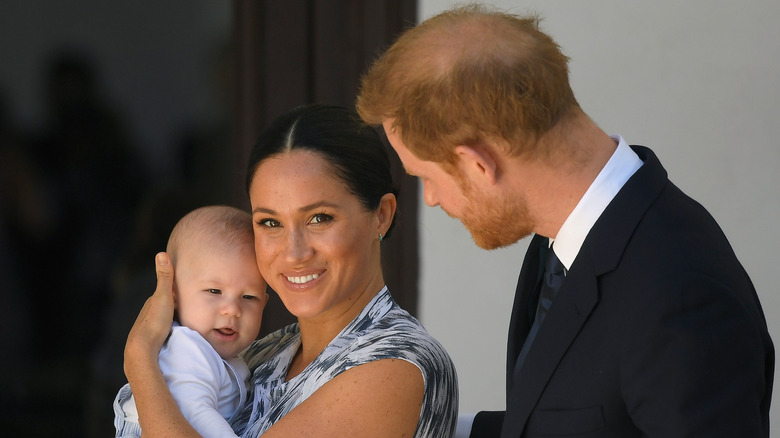 Meghan Markle, Prince Harry, and Archie smiling