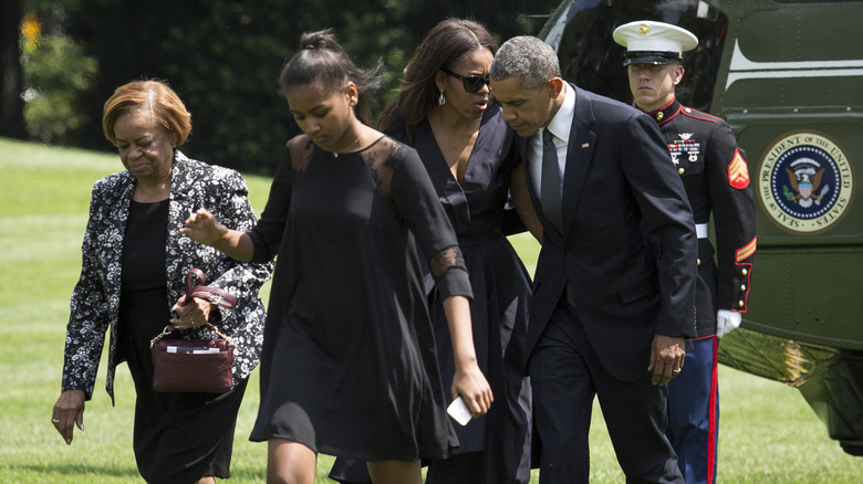 Marian Robinson walking with The Obamas