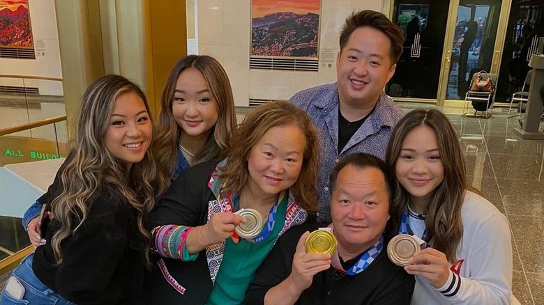 Sunisa Lee's family with her Olympic medals
