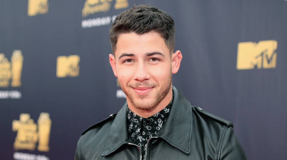 Nick Jonas smiling