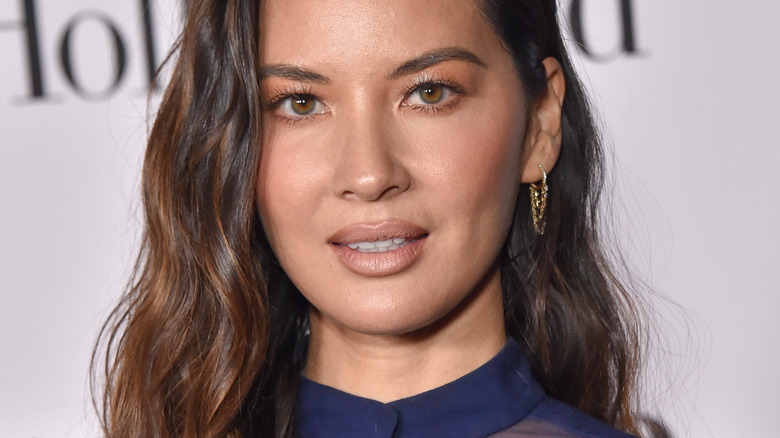 Olivia Munn posing at the Billboard Music Awards
