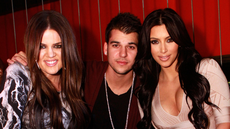 Rob Kardashian with sisters Khloe and Kim
