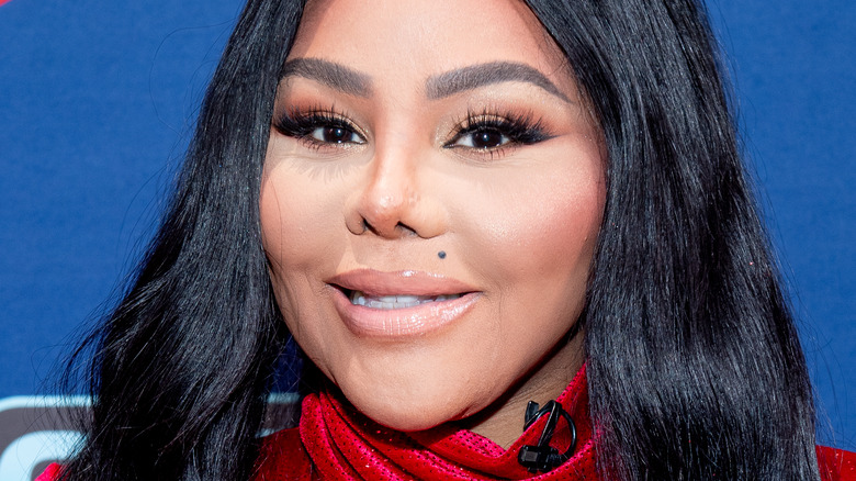 Lil' Kim smiling