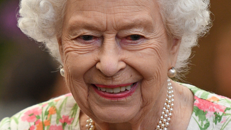 Queen Elizabeth II smiling in 2021