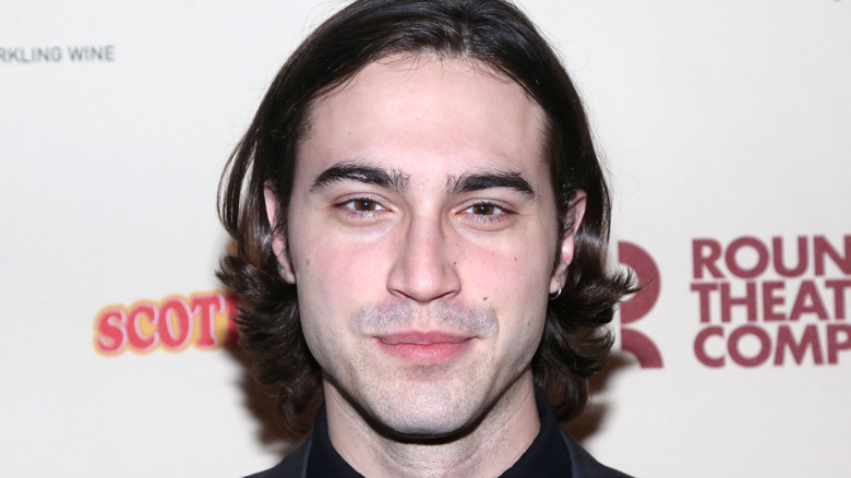 Ryan McCartan with slight smile at an event