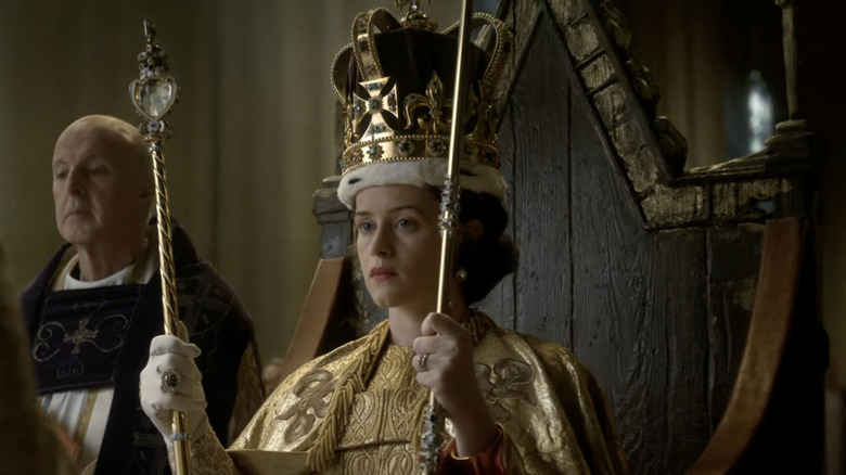 Claire Foy as the queen in the coronation scene of The Crown