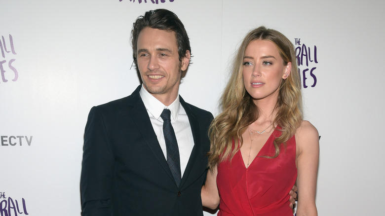 James Franco and Amber Heard smiling