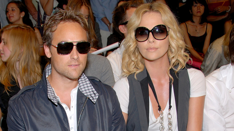 Stuart Townsend and Charlize Theron posing