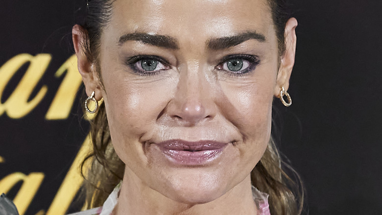 Denise Richards smirking