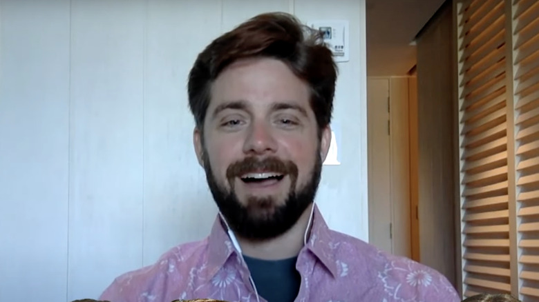 Below Deck star Edde Lucas grinning