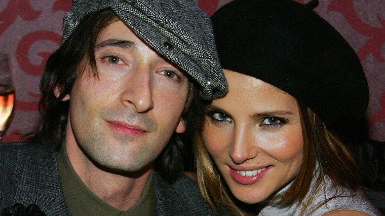 Adrien Brody and Elsa Pataky smile 