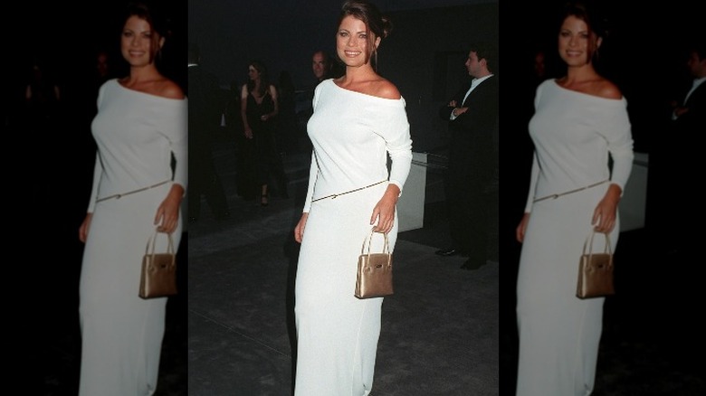 Yasmine Bleeth dressed in white