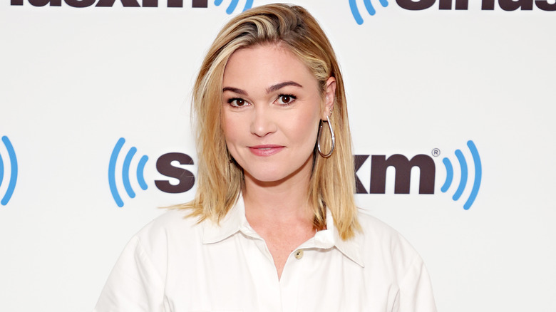 Julia Stiles wearing white blouse 