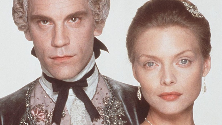 Michelle Pfeiffer and John Malkovich posing in character