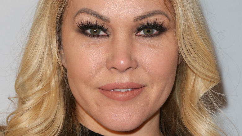 Shanna Moakler poses with her hair down