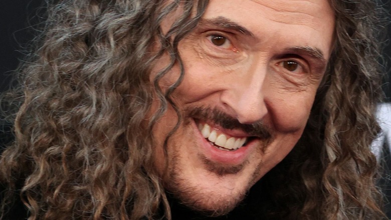 Weird Al Yankovic smiling.