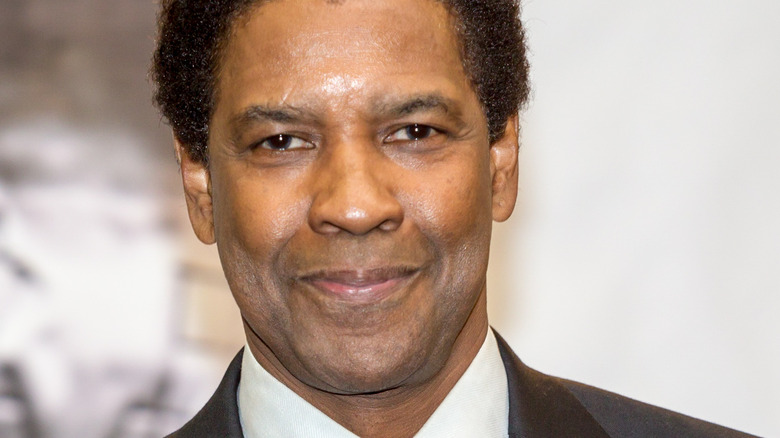 Denzel Washington smiling clean shaven