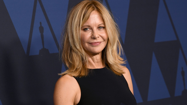 Meg Ryan wearing a black dress