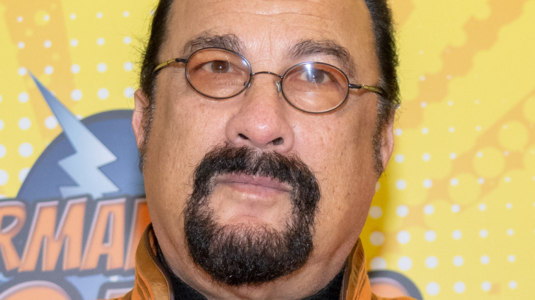 Steven Seagal goatee oval glasses