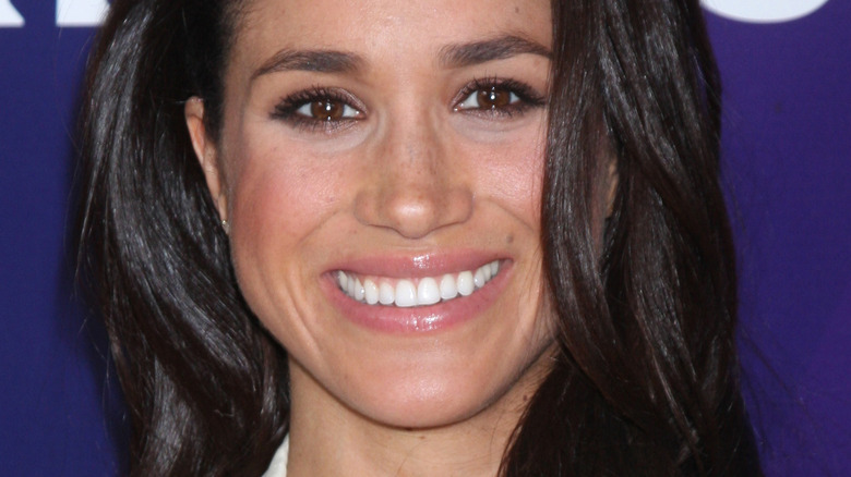 Meghan Markle with wide smile