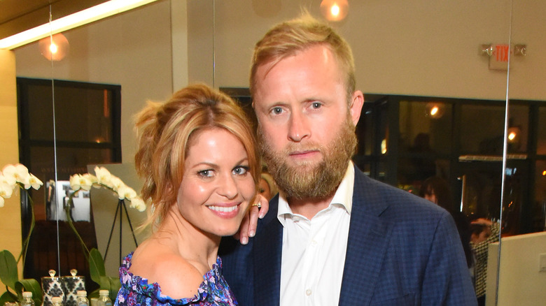 Candace Cameron and Valeri Bure smile 