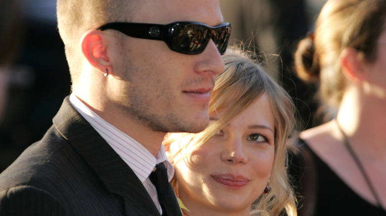 Michelle Williams and Heath Ledger smiling