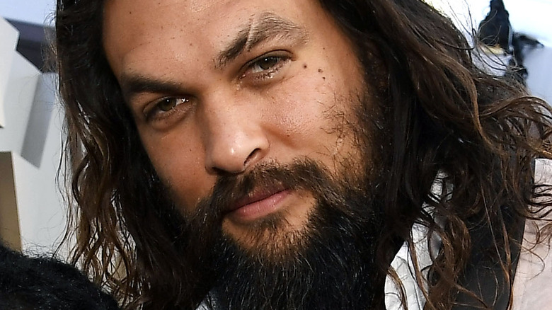 Jason Momoa and Lisa Bonet smiling