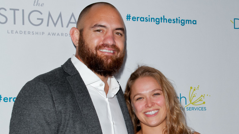 Travis Browne and Ronda Rousey pose together