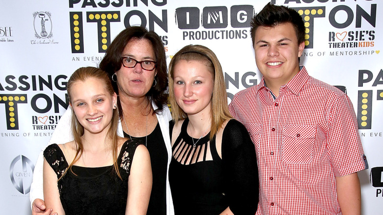 Rosie O'Donnell posing with three of her kids