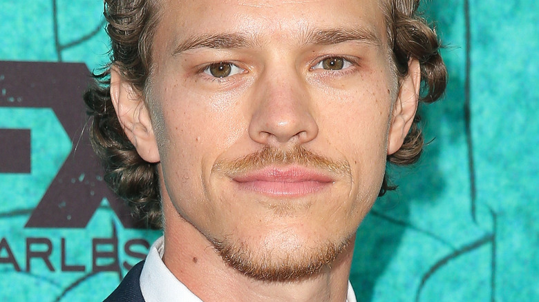 Ryan Dorsey with longer curly hair