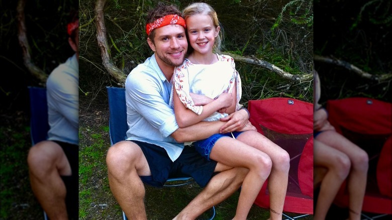 Ryan Phillippe and Ava Phillippe posing for photo