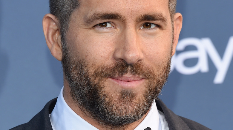 Ryan Reynolds posing at an event