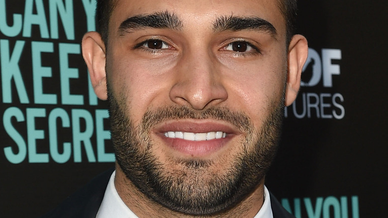 Sam Asghari smiling