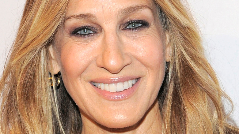 Sarah Jessica Parker smiles with hair down