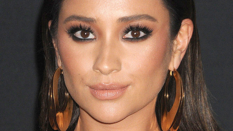 shay mitchell gold hoop earrings