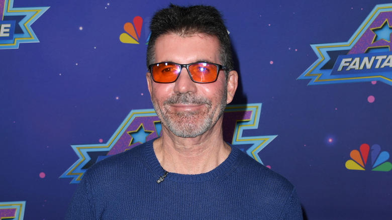 Simon Cowell wearing glasses