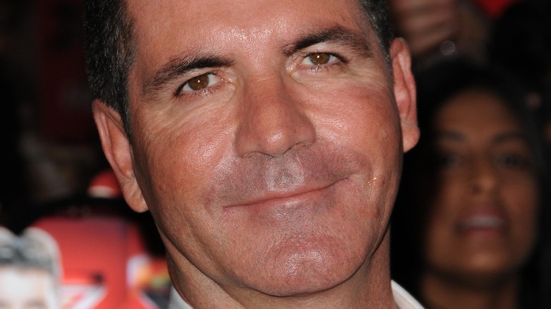 Simon Cowell posing