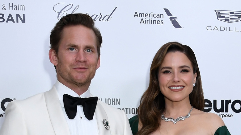 Grant Hughes and Sophia Bush red carpet